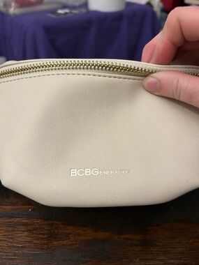 BCBGeneration Ivory Cosmetic Pouch with Gold Hardware